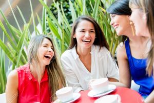 16848434-Group-of-girls-having-a-coffee-and-talking-Stock-Photo-women-talking-friends